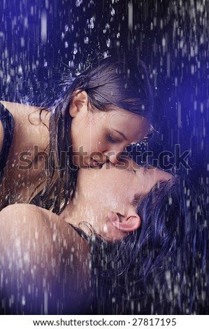 kissing in rain. stock photo : Kissing In The