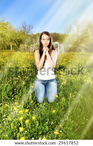 Light from heaven/girl pray in garden