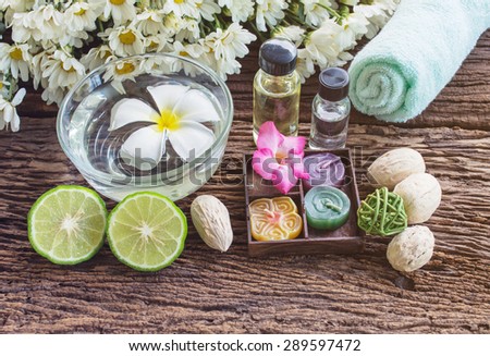 Thai herbal for spa therapy with Kaffir Lime on wooden background