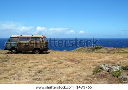 VW Bus parked on a cliff.  It looks like a very weary traveler.  This photo looks great cropped into a panoramic view.