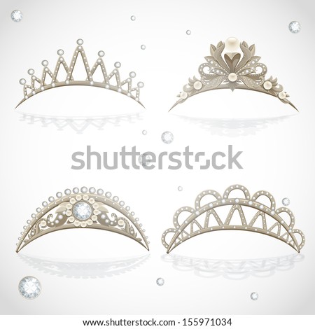 Shining gold tiaras with diamonds and pearls Shining gold tiaras with diamonds and pearls