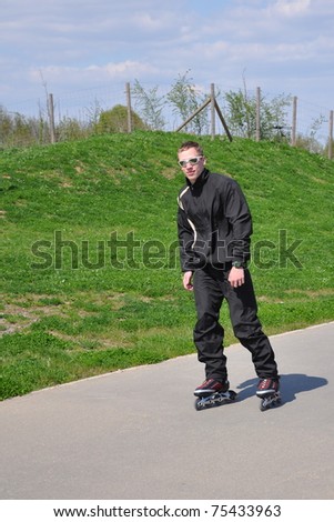 Young man on the roller blades