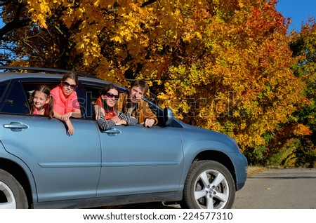 Car trip on autumn family vacation, happy parents and kids travel and have fun, car insurance concept