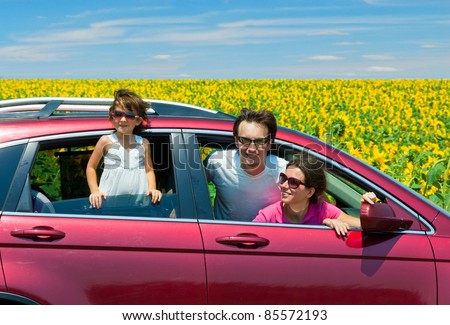 Family vacation. Parents with child in car trip