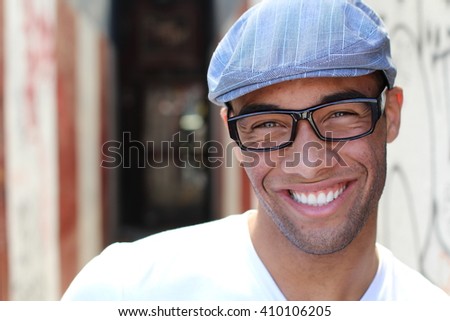 Healthy Smile. Teeth Whitening. Beautiful Smiling Young man Portrait close up. Over modern corridor background . Laughing businessman with Perfect Shin. Copy space for text.