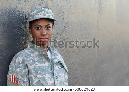 Veteran Female African American Soldier with Neutral Expression and Copy Space