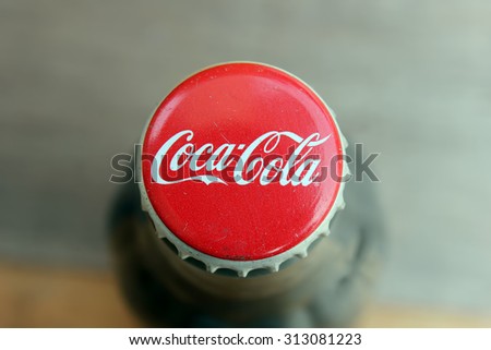SEREMBAN, MALAYSIA - MAY 22, 2015: bottle caps can of Coca-Cola Classic