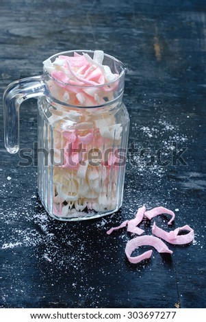 Candied Coconut - White sugar and Pink sugar version On Wooden Background