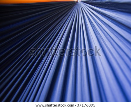 Pleated blue fabric with yellow edge