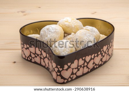 Homemade cookies in a tin box in the shape of a heart 3