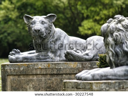 Stone statue of a lion, England