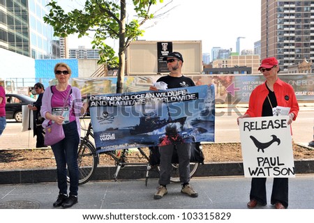 TORONTO, CANADA  MAY 23:  Protesters gather at Yonge and Bloor to protest the arrest and potential extradition of Sea Shepherd founder Paul Watson May 23, 2012 in Toronto, Canada.