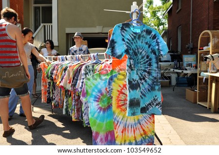 OTTAWA, CANADA - MAY 26: Thousands of people gather at the annual Glebe neighborhood garage sale which takes place for several blocks in the Glebe area of Ottawa, Ontario May 26, 2012.