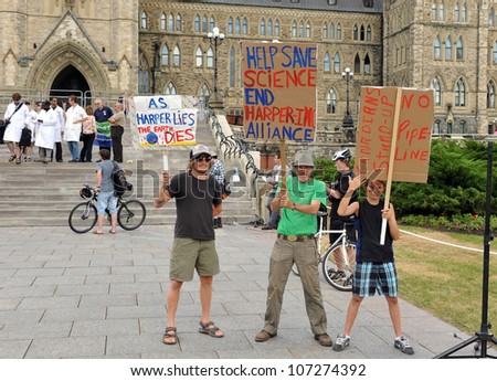 OTTAWA, CANADA - JUL10:  Hundreds of Canadian scientists marched on Parliament Hill to protest deep cuts and restrictions to their industry by the Conservative government July 10, 2012 in Ottawa.