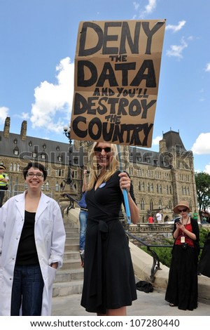 OTTAWA, CANADA - JULY 10:  Hundreds of Canadian scientists marched on Parliament Hill to protest deep cuts and restrictions to their industry by the Conservative government on July 10, 2012 in Ottawa, Canada.