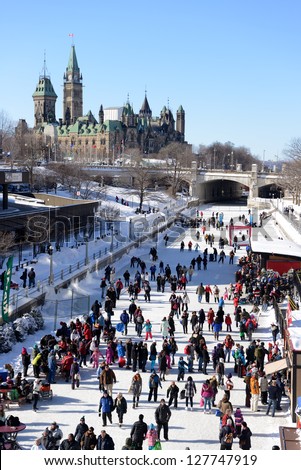OTTAWA, CANADA - FEBRUARY 9:  People celebrate the Winterlude festival in CanadaÂ?Â?s capital on the frozen Rideau Canal, the worldÂ?Â?s largest outdoor skating rink.  February 9, 2013 in Ottawa Ontario.