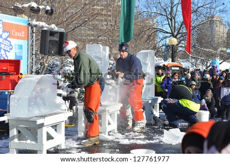 OTTAWA, CANADA - FEBRUARY 9:  Ice sculptors partake in a contest during the Winterlude festival  Confederation Park February 9, 2013 in Canada\'s capital of Ottawa, Ontario.