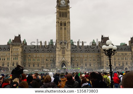 OTTAWA, CANADA - APR 20:  A haze of smoke hangs over Parliament Hill as the clock strikes 4:20 during a rally to legalize marijuana rally on Parliament Hill April 20, 2013 in Ottawa, Canada