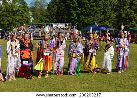 OTTAWA - JUN 22: Native women stand before judges after performing traditional dance at Summer Solstice Aboriginal Arts Festival for Aboriginal Day in Massey Park June 22, 2014 in Ottawa, Canada