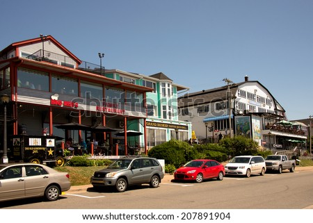 LUNENBURG, CANADA - JUL 27:  Restaurants along the waterfront draw tourists during the busy summer tourist season July 27, 2014 in the  UNESCO World Heritage Site town of Lunenburg, Nova Scotia