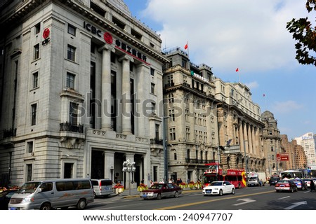 SHANGHAI, CHINA - NOV 20, 2014: The historic buildings of The Bund, a major financial center containing many banks on the Huangpu River, is a famous tourist attraction in Shanghai.
