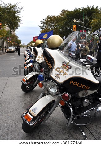OTTAWA, CANADA - SEPT 26: Golden Helmets Motorcycle Precision Team of the Ontario Provincial Police give a demonstration on Septmber 26, 2009 in Ottawa, Canada.