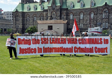 OTTAWA  - APRIL 14:  Canadian Tamils protest against the treatment of the Tamil people in Sri Lanka by the Singhalese government on April 14, 2009 in Ottawa, Canada.