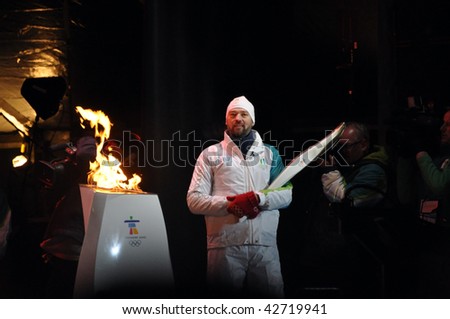 OTTAWA, CANADA - DECEMBER 12: Joe Juneau after lighting the torch at the Olympic Torch Relay ceremony in preparation for the 2010 Winter Olympics.  Ottawa, December 12, 2009.