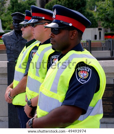 OTTAWA - AUG. 19: Ottawa police on duty at the protest of the Security and Prosperity Partnership talks in Ottawa, Canada on Aug. 19, 2007.