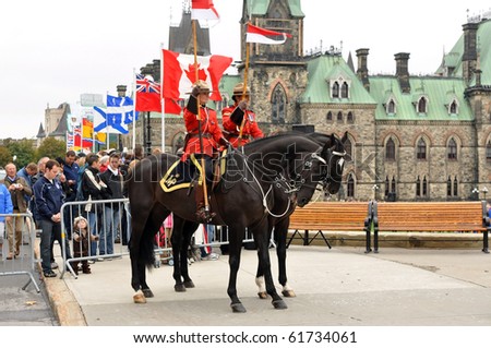 OTTAWA, CANADA - SEPT 26:  Royal Canadian Mounted Police on duty at the National Police and Peace Officer\'s Memorial on Parliament Hill.  September 26, 2010 Ottawa, Ontario.