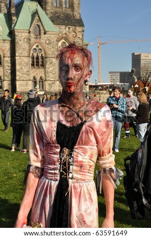 OTTAWA, CANADA - OCT 23:  Unidentified people dressed as zombies gather on Parliament Hill in Ottawa for the annual Zombie Walk, October 23, 2010 in Ottawa, Ontario.