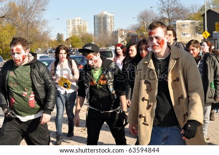OTTAWA, CANADA - OCT 23:  Unidentified people dress as zombies walk through Ottawa for the annual Zombie Walk, October 23, 2010 in Ottawa, Ontario.