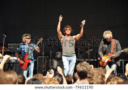 TORONTO, CANADA – JUNE 19: The popular 80’s band Platinum Blonde, led by Mark Holmes(c), perform at Celebrate Bloor festival on June 19, 2011 in Toronto, Ontario and announce a new upcoming world tour.