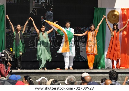 TORONTO, CANADA - AUG 13:  Unidentified dancers perform for India Independence Day at Yonge-Dundas Square August 13, 2011 in Toronto, Ontario, Canada.