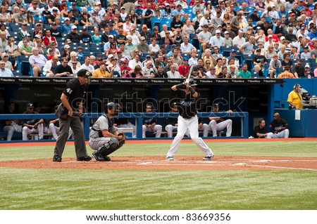 TORONTO, CANADA - AUG 28:  Reigning AL home run king Jose Bautista at bat against the Tampa Bay Rays at the Rogers Centre on August 28, 2011 in Toronto, Ontario, Canada.