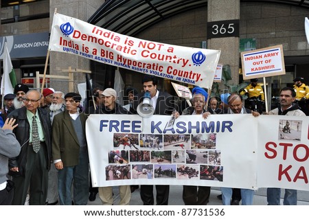 TORONTO, CANADA – OCT 30:  Unidentified protesters gathered outside the Indian Consulate on Bloor St E to protest the actions of the Indian Army in Kashmir,on Oct. 30 2011 in Toronto, Canada.