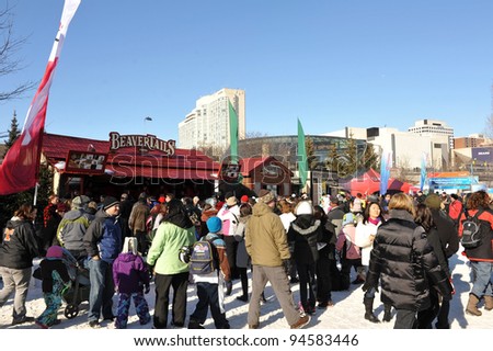 OTTAWA, CANADA - FEB 4: Thousands of people take part in the annual Winterlude Festival with local food such as Beaver Tails, at Confederation Park February 4, 2012 in Ottawa, Ontario, Canada.