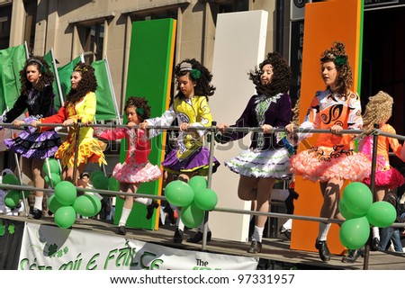TORONTO, CANADA - MARCH 11:  Young unidentified Irish dancers perform on a float in the St Patrick’s Day Parade, March 11, 2012 in Toronto, Ontario.