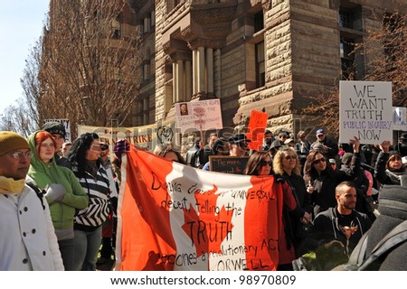 TORONTO, CANADA - MAR 31:  Protesters gathered to protest the election fraud committed in the last Canadian federal election and to call for election reform Mar 31, 2012 in Toronto, Ontario.