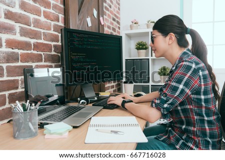 beauty smiling female programmer using computer working in office and typing data code to developing new system protection online user security.