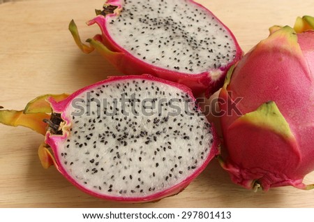 Dragon fruits on the wooden floor