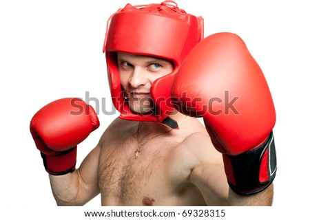 Professional boxer punch with gloves and protective headgear isolated on white background