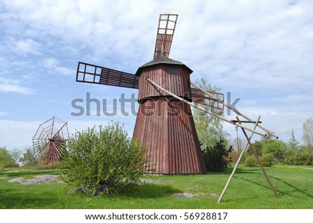 Two rare red wooden mills in Western Finland.