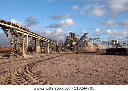 Open pit mining and processing plant for crushed stone, sand and gravel to be used in the roads and construction industry