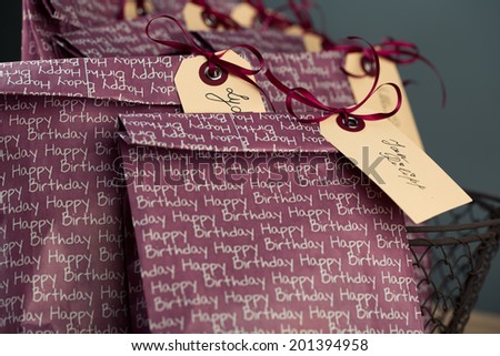 Violet Gift Bags with Name Tags at childs birthday party