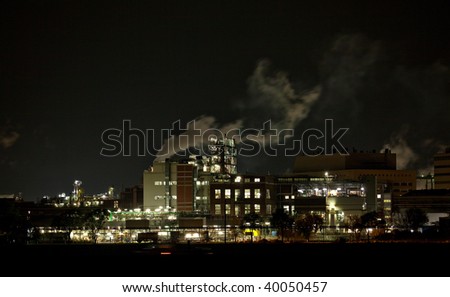Chemical Factory At Night, with smoke and steam