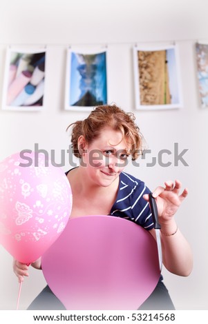 Funny Woman with pink balloon and knife