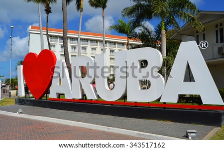 ORANJESTAD, ARUBA - FEBRUARY 20, 2015 - Since the I Love Aruba sign was erected in downtown Oranjestad, it has become one of the most photographed landmarks on the island