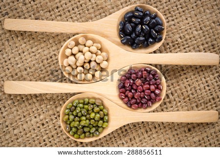 mix bean in the wood spoon on sack