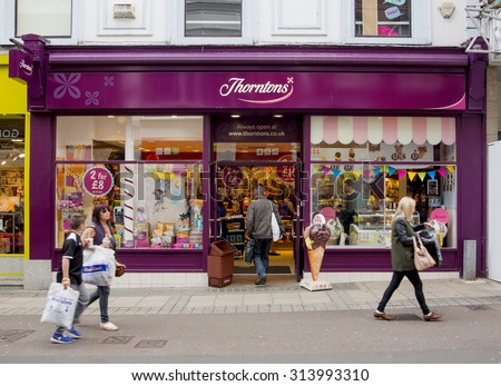 LEEDS, UK - 5 SEPTEMBER 2015. Thorntons Chocolate Shop.  People walking past and into the Thorntons Chocolate shop on a busy shopping day in Leeds.